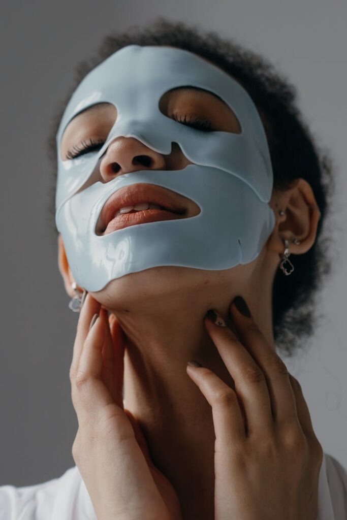 Mastering the First Impression: Your intriguing post title goes here Close-up of a woman with a hydrating sheet mask emphasizing skincare and beauty.